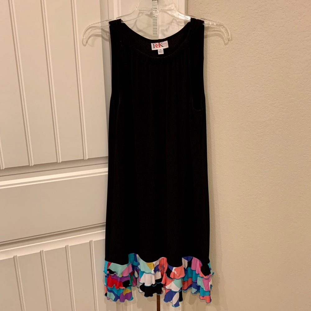 Black dress with colorful ruffle bottom